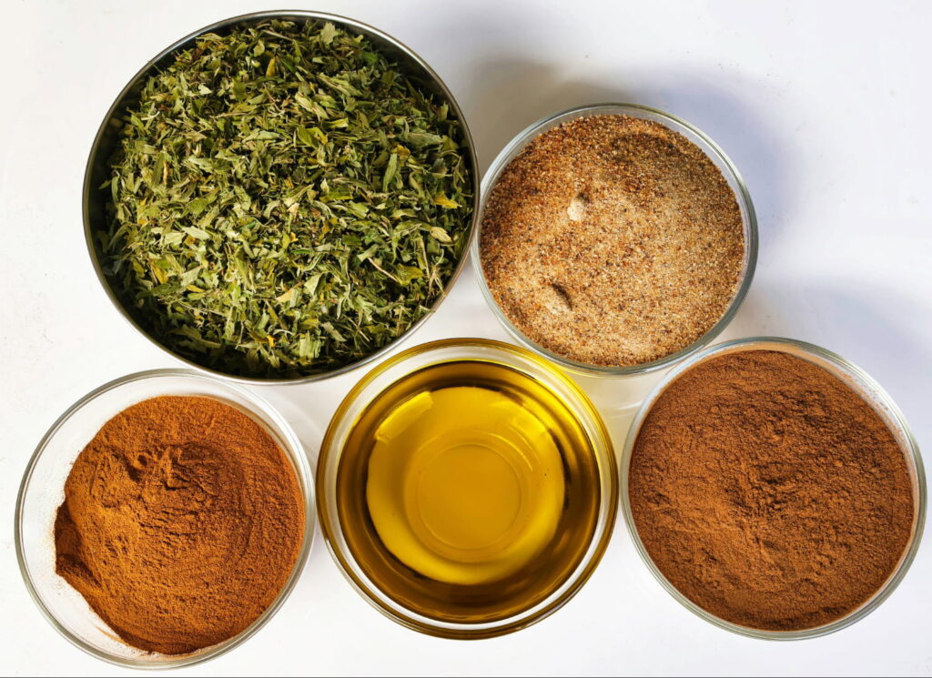 fresh herbs and oil in bowls